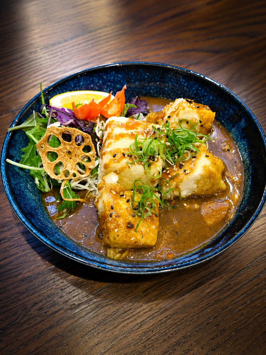 Tofu dish served in a blue bowl